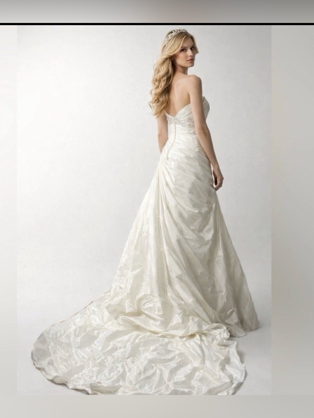 Elegant off white wedding Dress by Exclusive Bridals By A.c.e